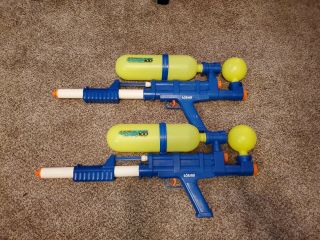 2 Larami Soaker 100 Water Guns Blue & Yellow 1990,