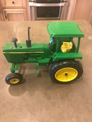 Ertl John Deere 4230 Diesel Tractor With 4 - Post Roll Gard Toy Farmer 1:16