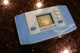 Sunwing Jungle Vintage Electronic Handheld Lcd Video Game And Watch Good