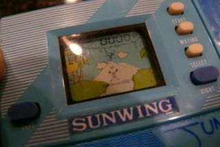 Sunwing Jungle Vintage Electronic Handheld LCD Video game and watch GOOD 4