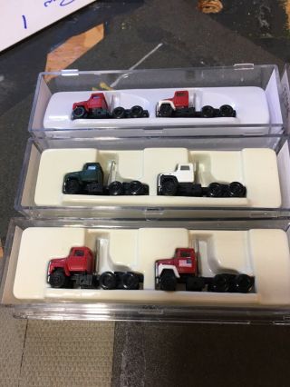 Atlas N Scale Ford L9000 Tractors And 100 N Scale Cars.