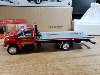First Gear Ford F - 650 With Miller Slide Back Carrier 1:34