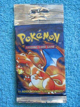 Pokemon Base Set 1 & Unweighed Long Pack Booster 1999 Charizard Artwork