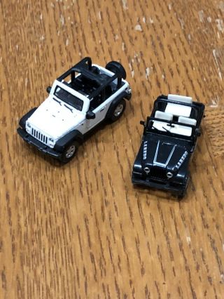 Ho 1 87 Scale Jeep Wrangler Rubicon White Welly And Jeep Laredo Black Roco