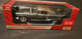 1957 Cadillac Brougham 1/18 Boxed Sunstar