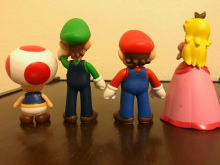 Mario,  Luigi,  Princess Peach,  and Toad Figurine Nintendo Characters 2