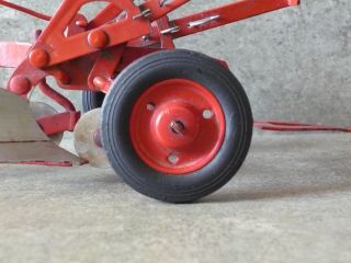 Rare 50s McCormick Deering two bottom plow.  Near.  Rare red wheels. 2