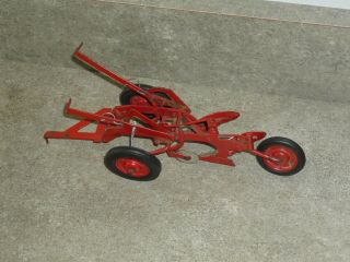 Rare 50s McCormick Deering two bottom plow.  Near.  Rare red wheels. 5