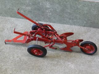 Rare 50s McCormick Deering two bottom plow.  Near.  Rare red wheels. 6
