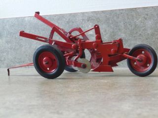 Rare 50s McCormick Deering two bottom plow.  Near.  Rare red wheels. 7