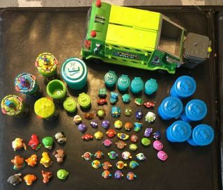Trash Pack Garbage Truck,  4 UFT Launchers,  12 Cans,  47 TP & 12 Grossery Gang 2