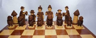 Vtg.  Handcarved Wooden Chess Set With Storage Folding Inlaid Game Board