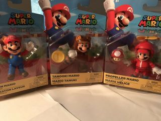 World Of Nintendo 4 - Inch Action Figure - Racoon Mario,  Propellor Mario & Tanooki