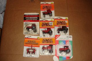 1/64 Group Of 7 International And Case Ih Toy Tractors And Implement