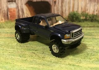 1999 Ford F - 350 Dually Lifted 4x4 Racing Champions Custom 1/64 Diecast Truck