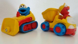Set Of 2 Sesame Street Toys Elmo On Dump Truck & Cookie Monster Construction