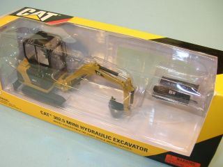 Miob Caterpillar Diecast 1:32 Cat 302.  5 Mini Hydraulic Excavator By Norscot