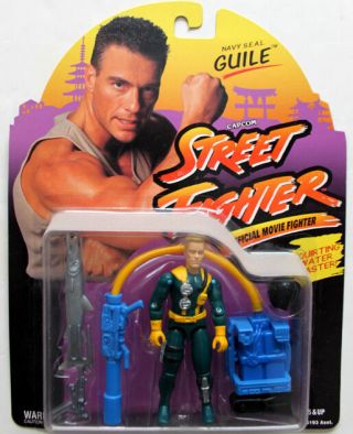Navy Seal Guile In The Movie Street Fighter In Green And Yellow Outfit.