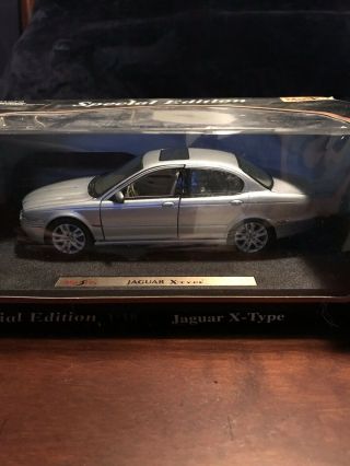 1:18 Maisto Jaguar X Type Special Edition Diecast Silver Car Model.