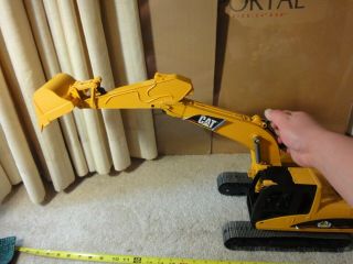 Bruder CAT,  Caterpillar Excavator,  Back Hoe.  Tonka compatible construction toy. 4