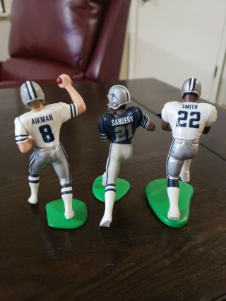 Troy Aikman,  Emmitt Smith and Sanders1996 Starting Lineup Dallas Cowboys Keener 2