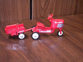 Collectibles Red Wagons,  Wheelbarrow,  Tractor And Wagon,  7 Piece Total