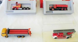 4 DIFFERENT 1/87 TRUCKS EACH HAS MINOR ISSUE (S) OR MISSING PART (S) 2