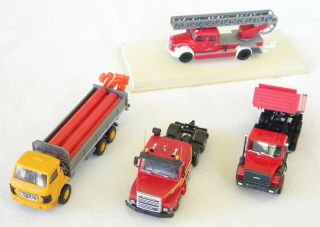 4 DIFFERENT 1/87 TRUCKS EACH HAS MINOR ISSUE (S) OR MISSING PART (S) 3