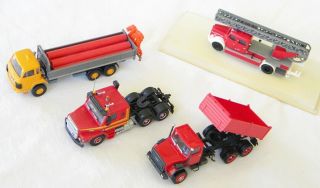 4 DIFFERENT 1/87 TRUCKS EACH HAS MINOR ISSUE (S) OR MISSING PART (S) 4