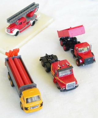 4 DIFFERENT 1/87 TRUCKS EACH HAS MINOR ISSUE (S) OR MISSING PART (S) 5