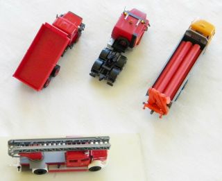 4 DIFFERENT 1/87 TRUCKS EACH HAS MINOR ISSUE (S) OR MISSING PART (S) 7