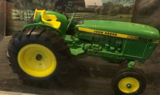 Die - Cast Vintage Ertl John Deere 1/16 tractor with case,  Two backgrounds RARE 2