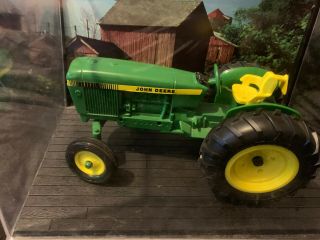 Die - Cast Vintage Ertl John Deere 1/16 tractor with case,  Two backgrounds RARE 7