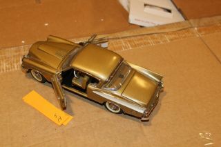 S14 Danbury 1957 Studebaker Golden Hawk 1:24 Gold,  No Box or 4