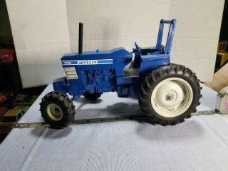 Vintage Ertl Ford Tractor 7710,  Cast Farm Toy,  U.  S.  A.