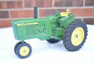Vintage John Deere Toy Tractor Pressed Metal Made In Usa Farm Equipment Toys 9x5