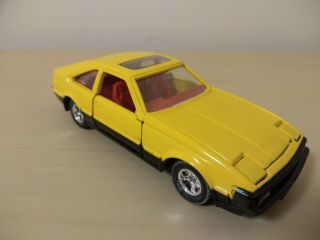 Toyota Supra Yellow 1/43 Scale By Tomica Dandy