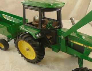 Ertl Diecast Farm Toy Tractor 1/16 Scale John Deere With Loader Bucket & Trailer