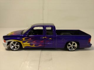 2002 Dodge Ram Quad Cab 1500 Sport In A Purple 1:24 Scale Diecast Welly Dc2521