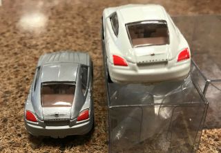 Racing Chamions 1/64 Dealer Promo in PVC 2003 Chrysler Crossfire SILVER,  WHITE 2