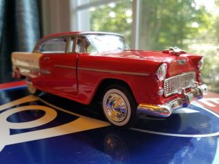 1955 Chevrolet Bel Air Red 1/24 Diecast Model Car By Motormax American Classics