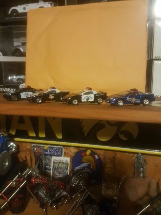 Four 1/64 Scale Chevy Camaro Z28 Diecast Police Cars - Matchbox Highway Patrol