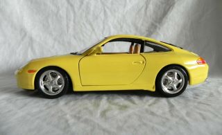 Bburago 1997 Porsche 911 Carrera 1/18 Diecast Yellow