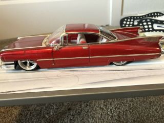 Dub City 1959 Candy Red Cadillac Coupe Deville 1:24 Scale Jada Toys Old Skool.