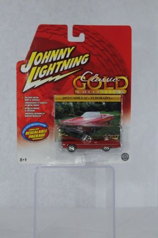 Johnny Lightning Diecast Car Classic Gold Collect.  73 Cadillac El Dorado Red Nip