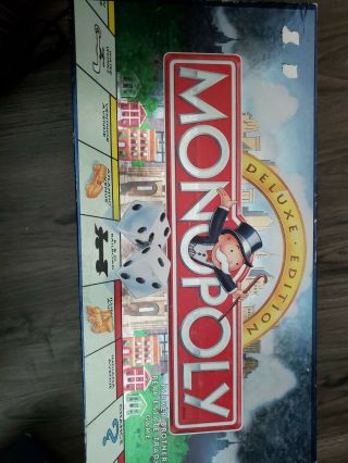 Monopoly Delux Edition With Wooden Houses,  Property Card Wheel And Money Organiz
