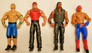 Wwe & Wwf Elite Wrestling Action Figures - Cena,  Hogan,  Roman And Los Matadores