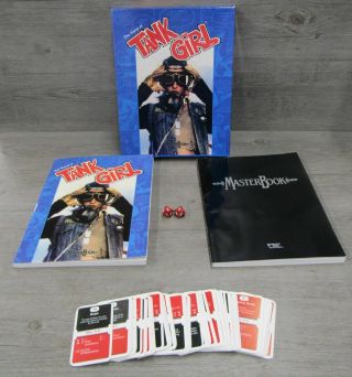 The World Of Tank Girl Masterbook Game With Approx 110 Cards 2 Dice 2 Books