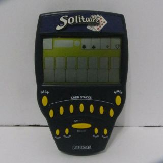 Radica Solitaire 1999 Yellow Buttons Electronic Handheld Game