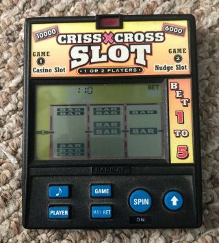 Rare Radica Hand Held Game Criss Cross Slot Machine Game Casino - -
